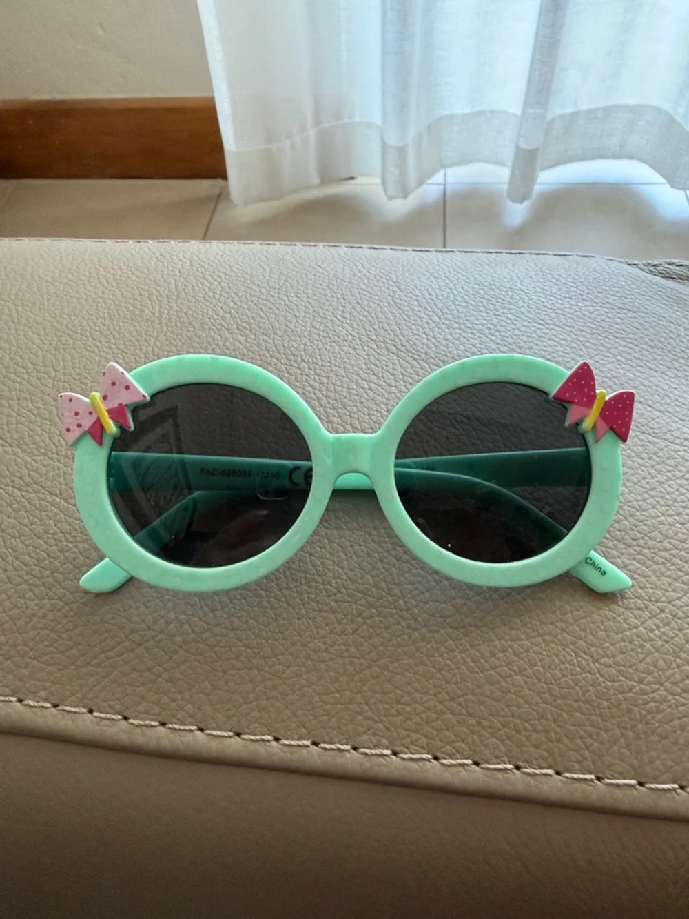 Disney Mint Green Round Kids Sunglasses with Pink Bow Accents
